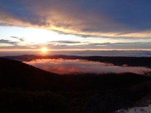 BEHOLD!  A beautiful and firey sunset atop Whitetop Mountain.  Myself and Joker (a hiker friend) sat up here and cooked dinner as we watched the show. The clouds below crept up the mountain and were suddenly struck aglow. 